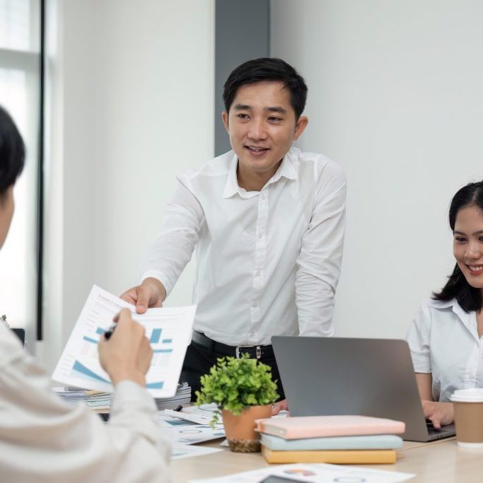 businesspeople at meeting collaboration and teamwork of work meeting new startup project idea presentation analyze plan marketing and investment in an office.